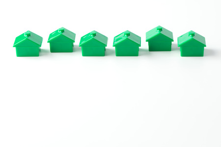 Row of green model houses for real estate industry conceptの写真素材