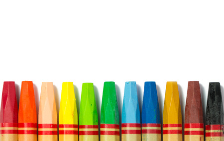 Row of colorful crayon isolated on white backgroundの写真素材