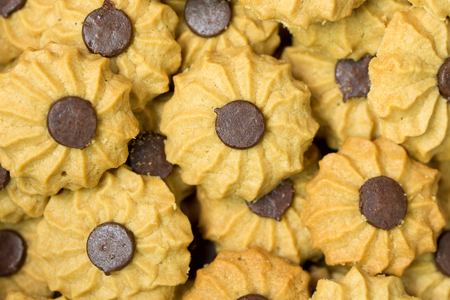 Closeup view of coffee butter chocolate chip cookie