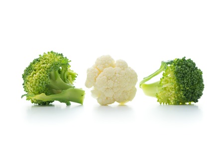 Fresh ripe organic broccoli and cauliflower isolated on white backgroundの写真素材