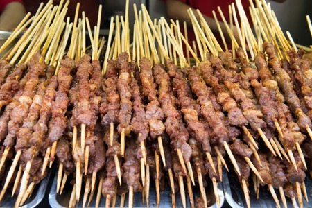 Grilled lamb meat on sticks at Wangfujing street, Beijing Chinaの写真素材
