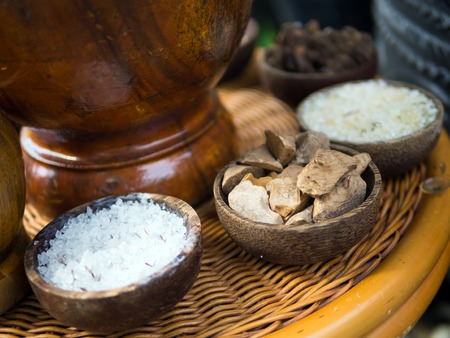 Traditional Indonesian or Thailand spices used in spa massage treatment.の写真素材