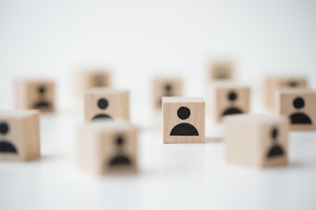 Group of wooden cube block with icon people for employment concept