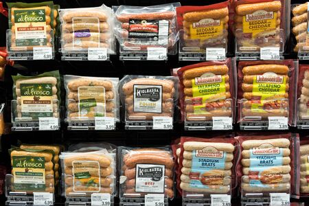 Detroit, USA - Nov 29, 2019 : Wide selection of smoked sausage on shelf display in a convenient store in Detroit, United Statesのeditorial素材