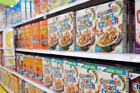 Detroit, USA - November 29, 2019: Grocery store shelf with boxes of various brands of breakfast cereal.のeditorial素材