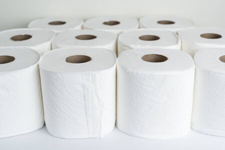Rolls of white toilet paper background for personal hygieneの写真素材