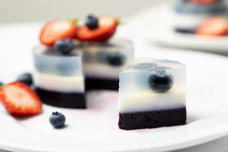 Mini blueberry fruit agar agar or jelly cake decorated with strawberry