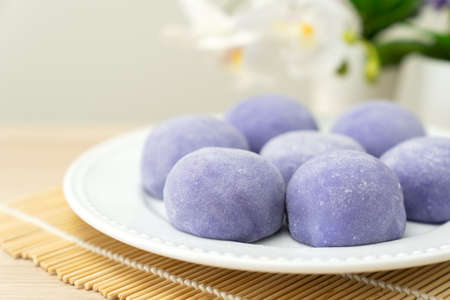 Purple color taro or yam mochi japanese dessertの写真素材