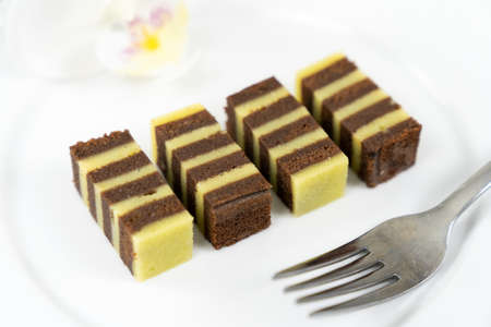 Traditional Sarawak Malaysia steamed chocolate layered cake, also known as Kek Lapis Legit
