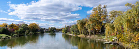 Fall colors along the river in rural landscape, Michigan, United States