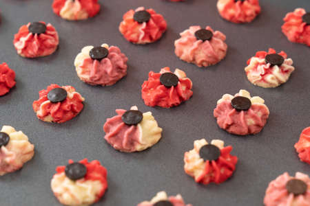 Homemade red and purple Chinese New Year bite size butter cookies