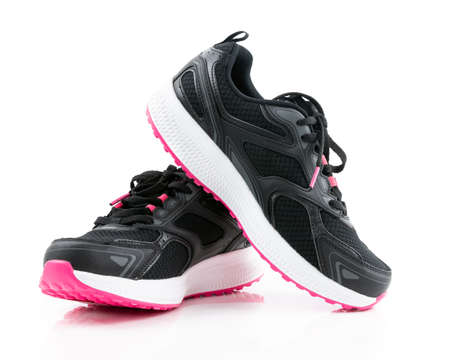 Pair of black sport shoes on white background