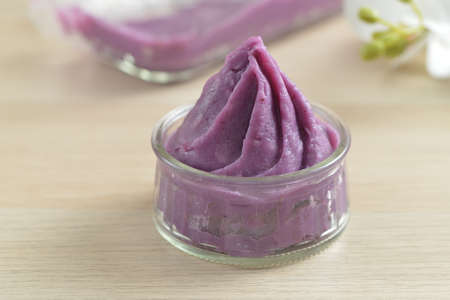 Sweet purple yam or taro paste in a glass bowl, asian dessert