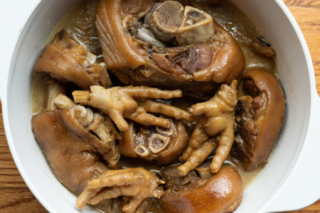 Southeast Asian Chinese style cuisine braised chicken feet and pork leg with mushroom and dark soy sauceの写真素材