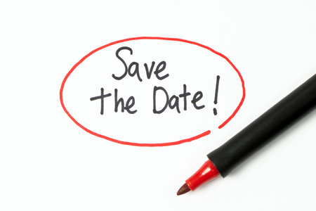 Handwriting text Save The Date with red marker pen, conceptual remember the schedule, appointment or invitationの写真素材