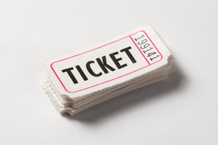 Stack of white vintage admission tickets isolated on white backgroundの写真素材