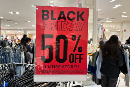 Black Friday advertising banner at the storefront during the holiday shopping season.の写真素材