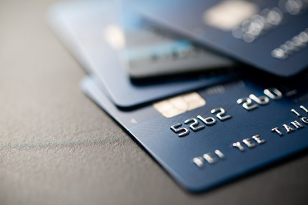 Macro low key credit card or debit card background with selective focus on microchipの写真素材
