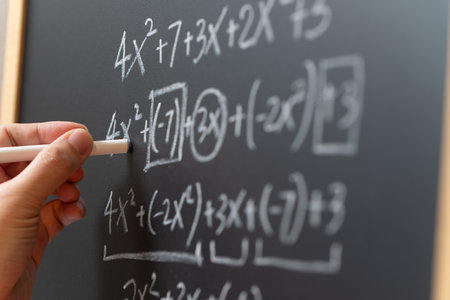 Mathematical operations and algebra mathematic formula written with chalk on the blackboard