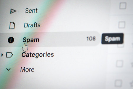 Close up computer or laptop monitor screen focus on spam or junk email folder, mouse clicker hover on spam button.の写真素材