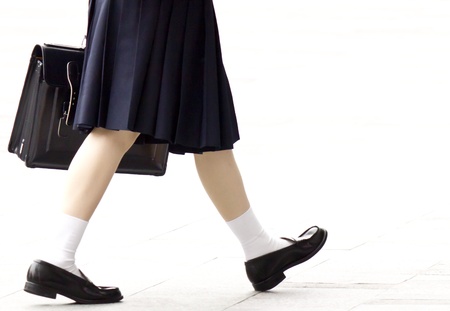 This is a picture of a high school girl is walking の写真素材