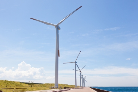 This is a photograph of a wind farm that I have taken in August.の写真素材