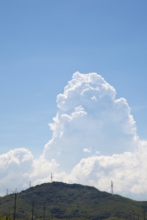 This is a photograph of a thunderhead that I have taken in August.の写真素材