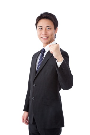 This is a picture of a young businessman posing guts.の写真素材