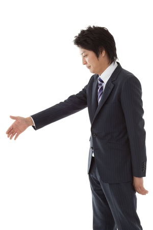 This is a picture of when you are seeking young businessman handshake.の写真素材