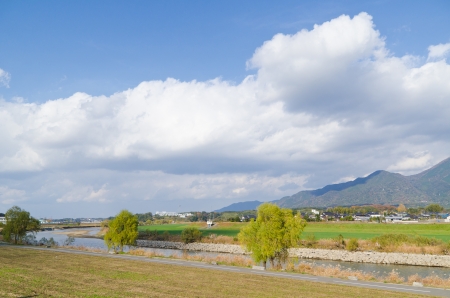 This is a photo of the autumn sky and the riverside I took in October.の写真素材