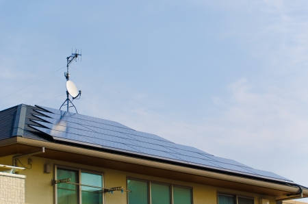This is a picture of the solar panels installed on the roof.の写真素材