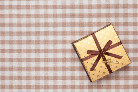 This is a photograph of a gold gift box.の写真素材