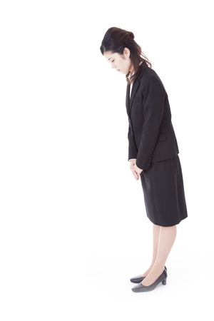 a business woman that has a bow.の写真素材