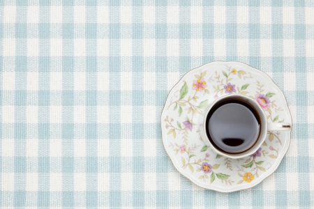 This is a photo of coffee on the table cloth.の写真素材