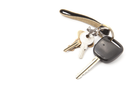 This is a photo of a key chain and keys.の写真素材