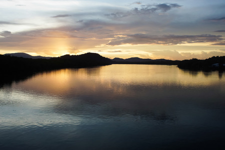 Lake the sky in the evening sun の写真素材