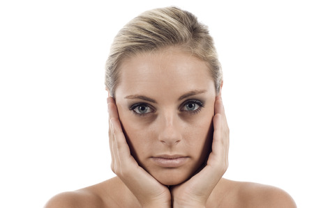 Portrait of a beautiful female model isolated over whiteの写真素材