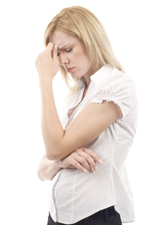 Young business woman showing stress isolated over white backgroundの写真素材