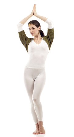 Full length of a beautiful brunette dancer princess Bollywood style isolated over white backgroundの写真素材