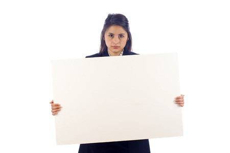 Hispanic / Latin Business woman holding empty white boardの写真素材