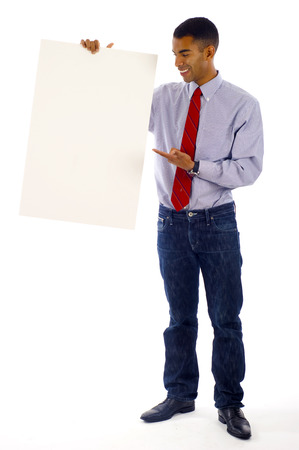 business man displaying a banner ad isolated over a white backgroundの写真素材