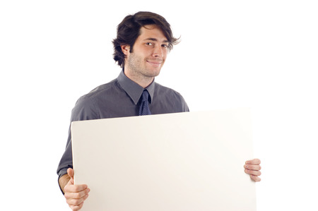 Business man displaying a banner ad isolated over a white backgroundの写真素材