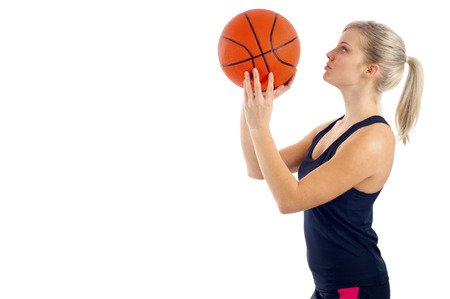 Blond Girl Shooting the Basketの写真素材