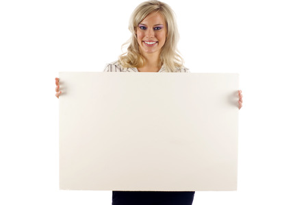 Beautiful Woman Holding a Blank Signの写真素材