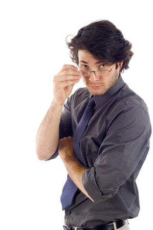 Young, confident & handsome business man staring at something, isolated over white backgroundの写真素材