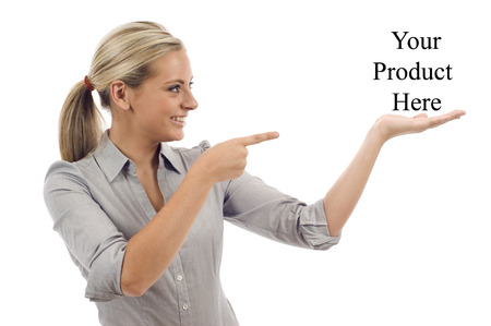 Attractive business woman shows your text isolated over a white backgroundの写真素材