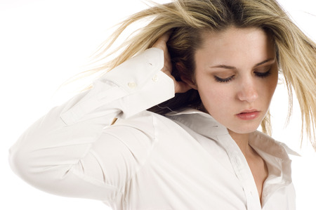 Fashion photo of beautiful woman with magnificent hair isolated over a white backgroundの写真素材