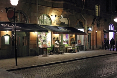 Stockholm, Sweden, January 18 2012, Almost empty street in a cold but snowfree winter eveningのeditorial素材