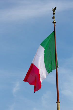2014 30th March Rome Italy A close up of the Italian flag sagging against the blue skyの写真素材