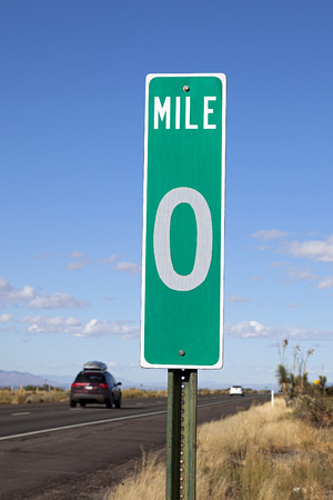 A Green Zero Mile Road Sign on the Freewayの写真素材
